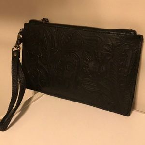 American Leather Co, wristlet with power bank.
